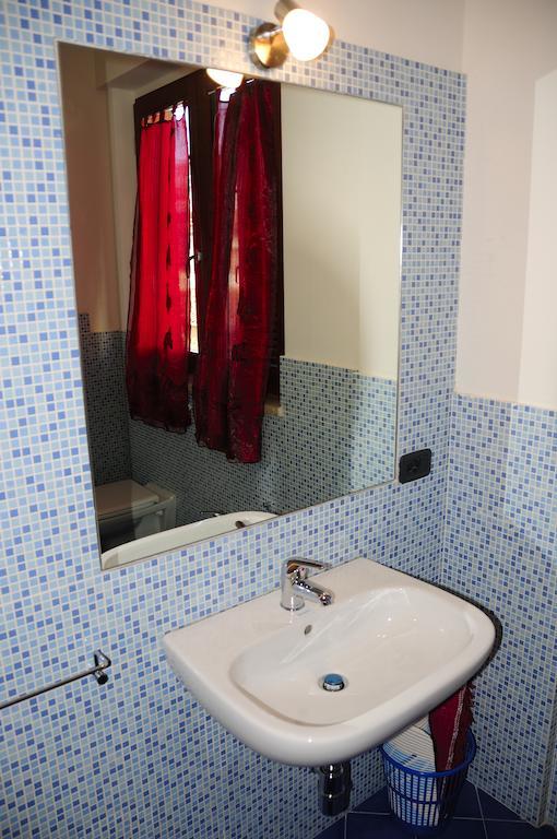 I Portici Appartamenti مارينا دي غروسيتو الغرفة الصورة